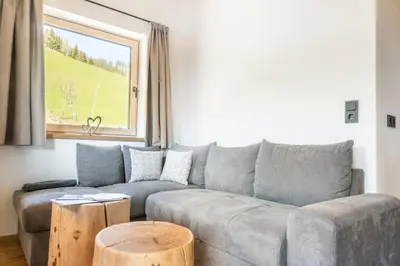 Ein Sitzbereich in der Unterkunft Appartement Bergpanorama Brandegg