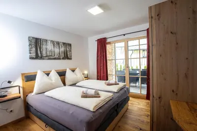 Ein Bett oder Betten in einem Zimmer der Unterkunft Dachstein Chalet