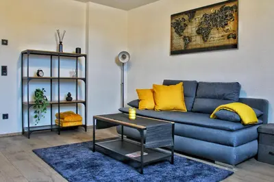 Ein Sitzbereich in der Unterkunft Idyllische Suite in Zentrumsnähe mit Parkplatz Top 1