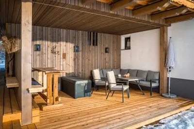 Ein Sitzbereich in der Unterkunft Chalet Schintlbauer