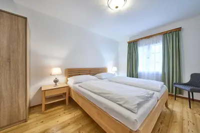 Ein Bett oder Betten in einem Zimmer der Unterkunft Ferienwohnung Salzafeld