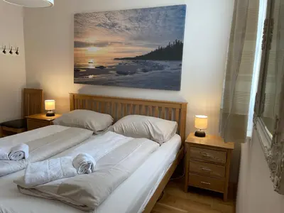 Ein Bett oder Betten in einem Zimmer der Unterkunft Lovely 3 Bedroom Apartment, Ski in/Ski out