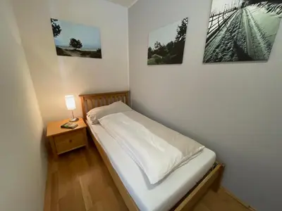 Ein Bett oder Betten in einem Zimmer der Unterkunft Lovely 3 Bedroom Apartment, Ski in/Ski out