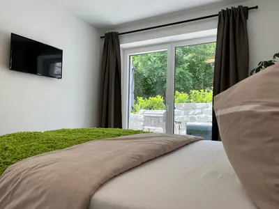 Ein Bett oder Betten in einem Zimmer der Unterkunft EXCLUSIVES APARTMENT - Auszeit Mondsee