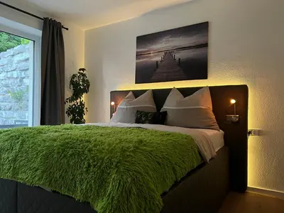 Ein Bett oder Betten in einem Zimmer der Unterkunft EXCLUSIVES APARTMENT - Auszeit Mondsee