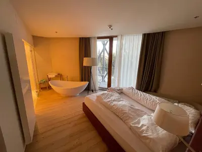 Ein Bett oder Betten in einem Zimmer der Unterkunft Large Family Apartment Katschberg, Ski-in/o, Sauna, Pool