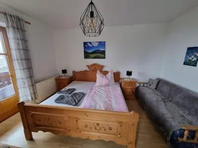 Ein Bett oder Betten in einem Zimmer der Unterkunft Urlaub am Bauernhof bei Familie Steinbrecher