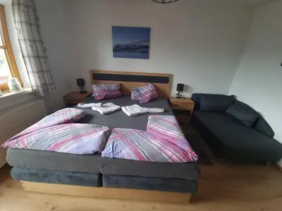 Ein Bett oder Betten in einem Zimmer der Unterkunft Urlaub am Bauernhof bei Familie Steinbrecher
