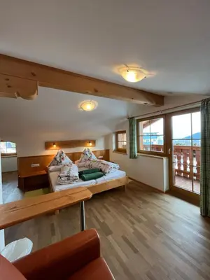Ein Bett oder Betten in einem Zimmer der Unterkunft Haus Alpenglühn