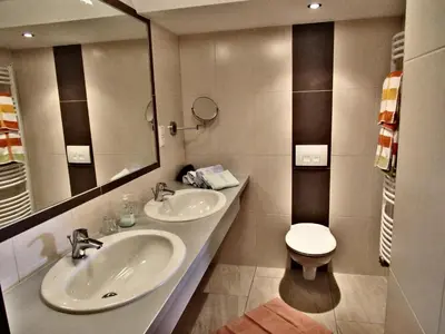 Ein Badezimmer in der Unterkunft Haus Alpenglühn