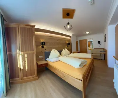 Ein Bett oder Betten in einem Zimmer der Unterkunft Haus Alpenglühn