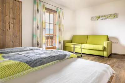 Ein Bett oder Betten in einem Zimmer der Unterkunft Ferienhaus Krametergut
