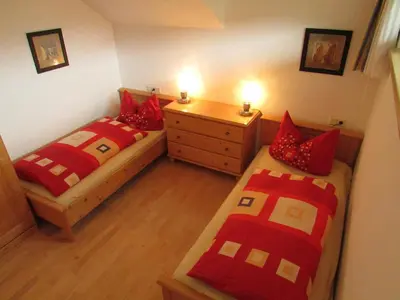 Ein Bett oder Betten in einem Zimmer der Unterkunft Juniorland II