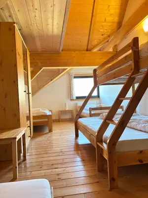 Ein Bett oder Betten in einem Zimmer der Unterkunft Apartments Steinwänd