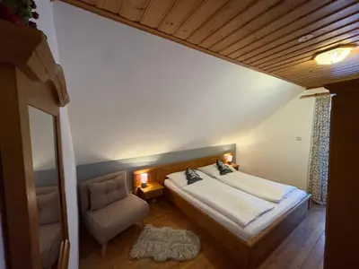 Ein Bett oder Betten in einem Zimmer der Unterkunft Gruppenhaus Hirzhof Ski In Ski Out Sommercard