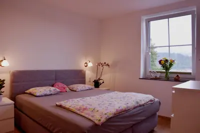 Ein Bett oder Betten in einem Zimmer der Unterkunft Bergblick Energiequelle