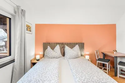 Ein Bett oder Betten in einem Zimmer der Unterkunft Hallstatt Lakeside Top 1