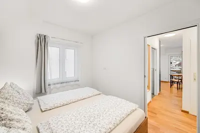 Ein Bett oder Betten in einem Zimmer der Unterkunft Hallstatt Lakeside Top 6 - Zimmer mit Balkon