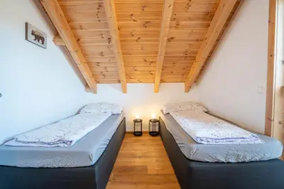 Ein Bett oder Betten in einem Zimmer der Unterkunft Bergzauber View