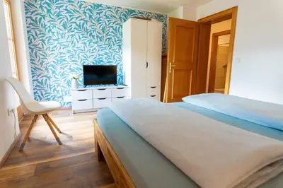 Ein Bett oder Betten in einem Zimmer der Unterkunft Apartment Bergglück im Lungau
