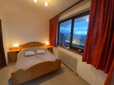 Ein Bett oder Betten in einem Zimmer der Unterkunft Dachstein Panorama-Lodge