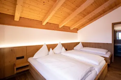 Ein Bett oder Betten in einem Zimmer der Unterkunft BergLeben Zaglauhof