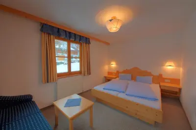 Ein Bett oder Betten in einem Zimmer der Unterkunft Liftstüberl Zaglauhof