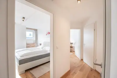 Ein Bett oder Betten in einem Zimmer der Unterkunft Penthouse Ski&Nature 