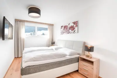Ein Bett oder Betten in einem Zimmer der Unterkunft Penthouse Ski&Nature 