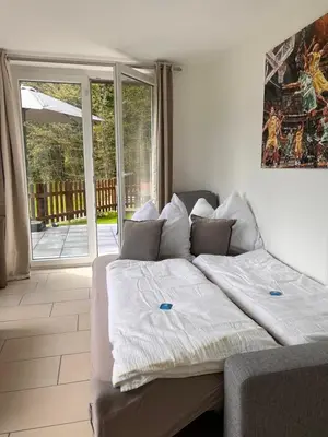 Ein Bett oder Betten in einem Zimmer der Unterkunft Ferienwohnung Traunkirchen mit Seeblick