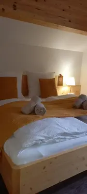 Ein Bett oder Betten in einem Zimmer der Unterkunft Apartment Schönwetter