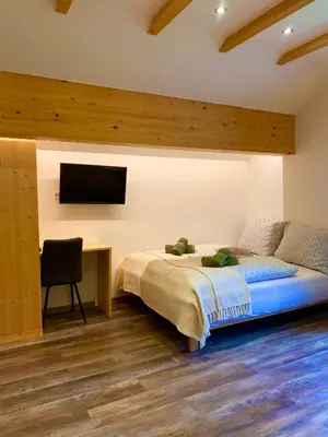 Ein Bett oder Betten in einem Zimmer der Unterkunft Apartment Schönwetter