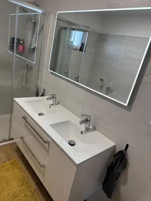 Ein Badezimmer in der Unterkunft Resort am Winklfeld 8a