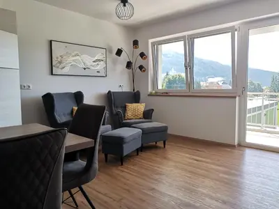 Ein Sitzbereich in der Unterkunft Berg:Zeit_Apartments