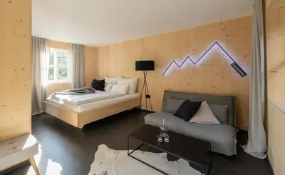 Ein Bett oder Betten in einem Zimmer der Unterkunft Basecamp Salzkammergut - Exklusives Apartment mitten im Salzkammergut