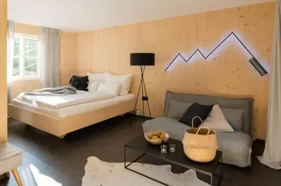 Ein Bett oder Betten in einem Zimmer der Unterkunft Basecamp Salzkammergut - Exklusives Apartment mitten im Salzkammergut