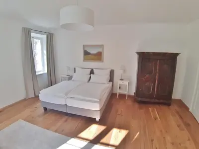 Ein Bett oder Betten in einem Zimmer der Unterkunft Maria Theresia Berghaus Apartments