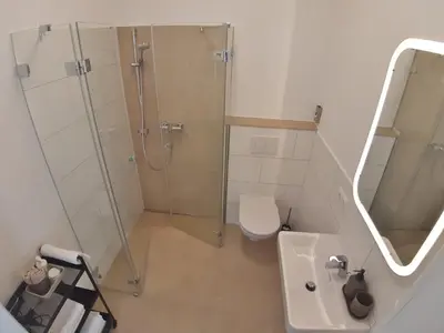 Ein Badezimmer in der Unterkunft Maria Theresia Berghaus Apartments