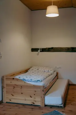 Ein Bett oder Betten in einem Zimmer der Unterkunft Stangllehen Hütte