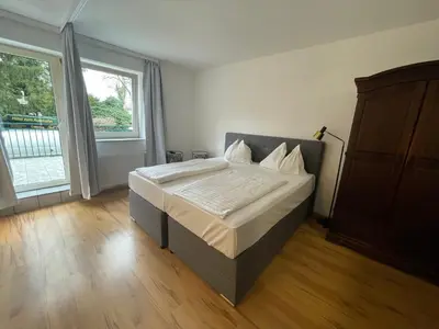 Ein Bett oder Betten in einem Zimmer der Unterkunft Ferienhaus Auerhahn