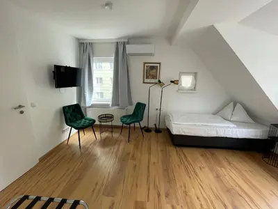 Ein Bett oder Betten in einem Zimmer der Unterkunft Ferienhaus Auerhahn