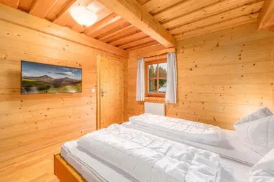 Ein Bett oder Betten in einem Zimmer der Unterkunft Chalet Dachsteinblick