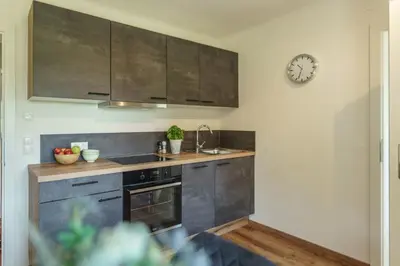 Küche/Küchenzeile in der Unterkunft Neues Luxus APARTMENT DACHSTEIN - Ramsau am Dachstein - inklusive Sommercard!