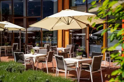 Ein Restaurant oder anderes Speiselokal in der Unterkunft Vivea Hotel Bad Goisern