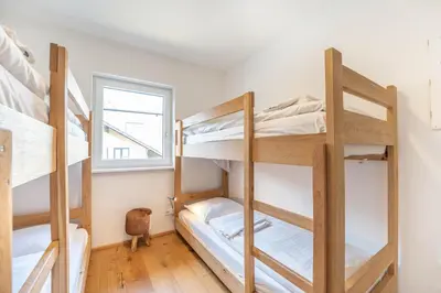Ein Bett oder Betten in einem Zimmer der Unterkunft Penthouse Heidi