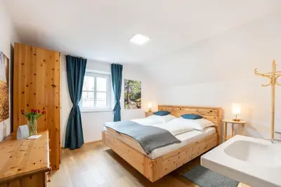 Ein Bett oder Betten in einem Zimmer der Unterkunft Ferienhaus Zur alten Mühle