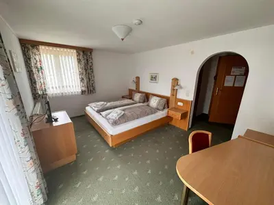 Ein Bett oder Betten in einem Zimmer der Unterkunft Gasthof Schönblick Rußbach
