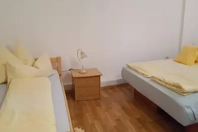 Ein Bett oder Betten in einem Zimmer der Unterkunft Helles und großzügiges Souterrain Appartement