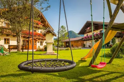 Ein Kinderspielbereich in der Unterkunft Unterwöhrlehen