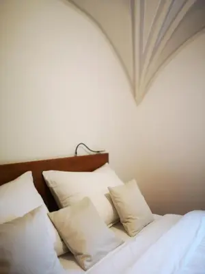 Ein Bett oder Betten in einem Zimmer der Unterkunft Villa Franz Xaver